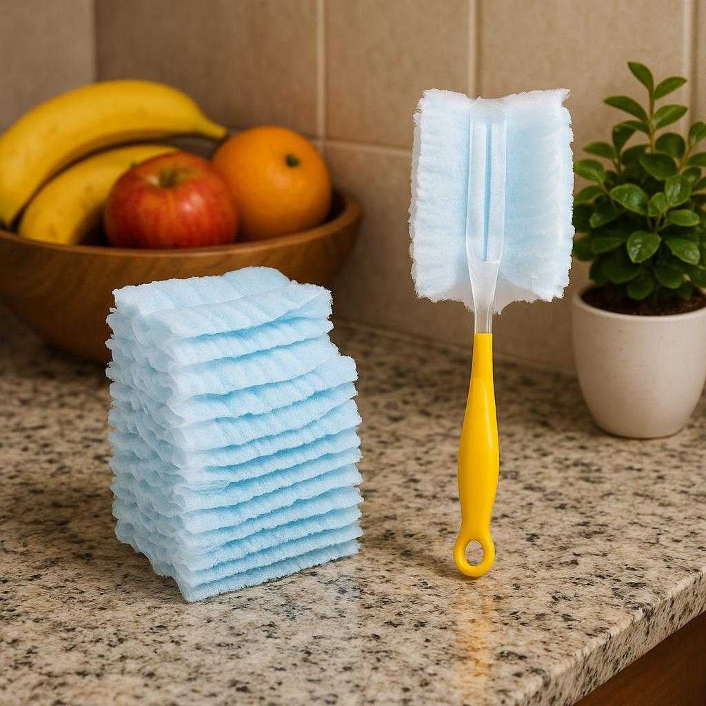 engangsstvklude-i-bl-og-gul-30-stk-til-effektiv_15221002633603_scene2 Engangsstøvklude i Blå og Gul - 30 stk. til Effektiv Støvfjerning og Rengøring i Hjemmet: A different realistic kitchen setting where the product is securely positioned on a granite countertop, being naturally placed beside a bowl of fruit and a small potted plant.